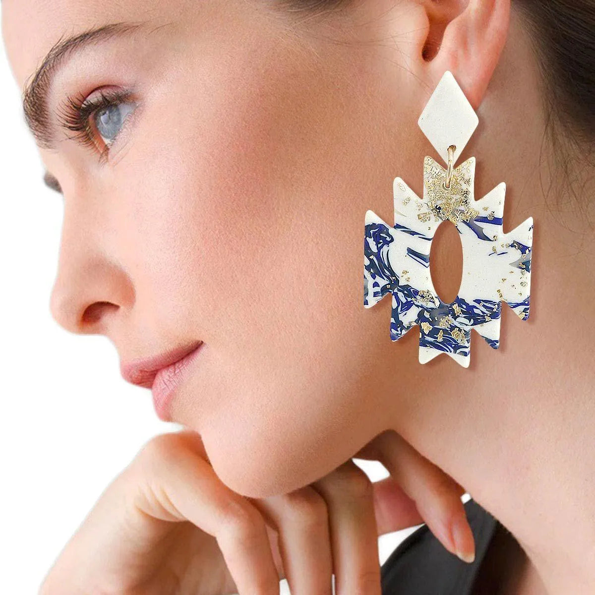 Get Noticed with Stunning Blue and White Zig-Zag Earrings Jewelry Bubble