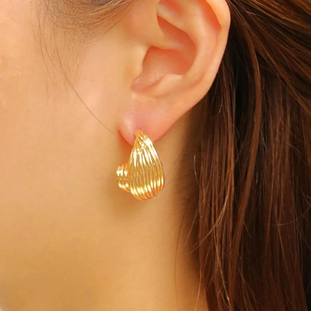 Gleam Gold Spiral Small Earrings for Fashion Jewelry Devotees