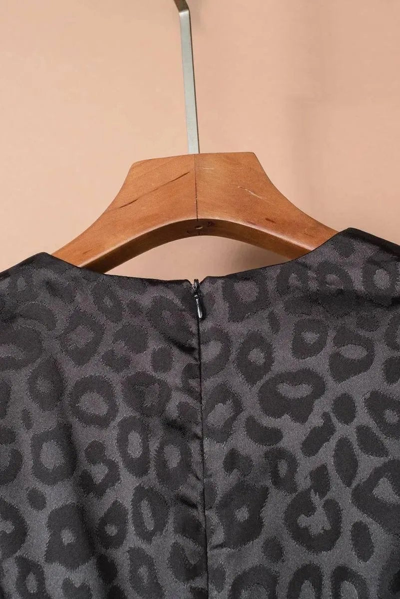 Seductive Mini Dress: Embrace Your Inner Leopard in Black