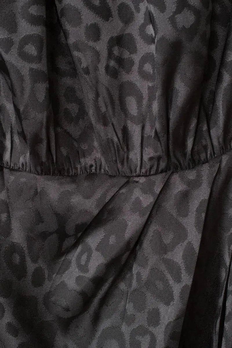 Seductive Mini Dress: Embrace Your Inner Leopard in Black