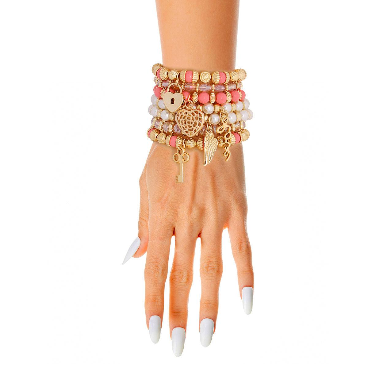 Elegant 7 Piece Gold Tone Beaded Bracelet Set - Perfect for Adding Charm to Your Outfit!