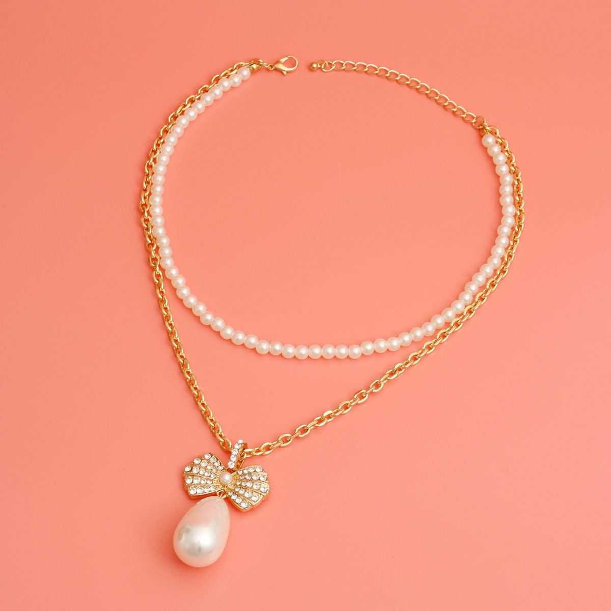 Elegant Gold Bow & Pearl Drop Pendant Necklace: Timeless Elegance for Every Occasion