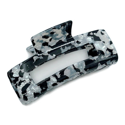 Enhance Your Hairstyles with our Black Marbled Hair Claw Clip