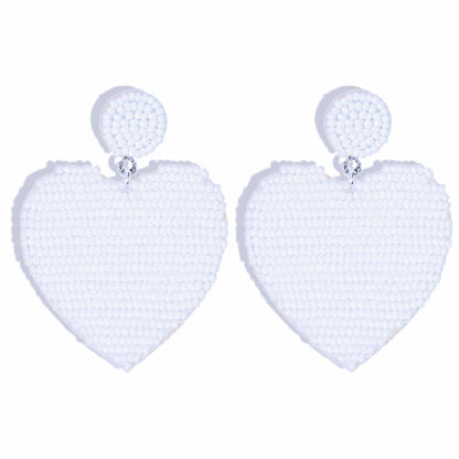 Feel the Love: White Heart Earrings for Every Style