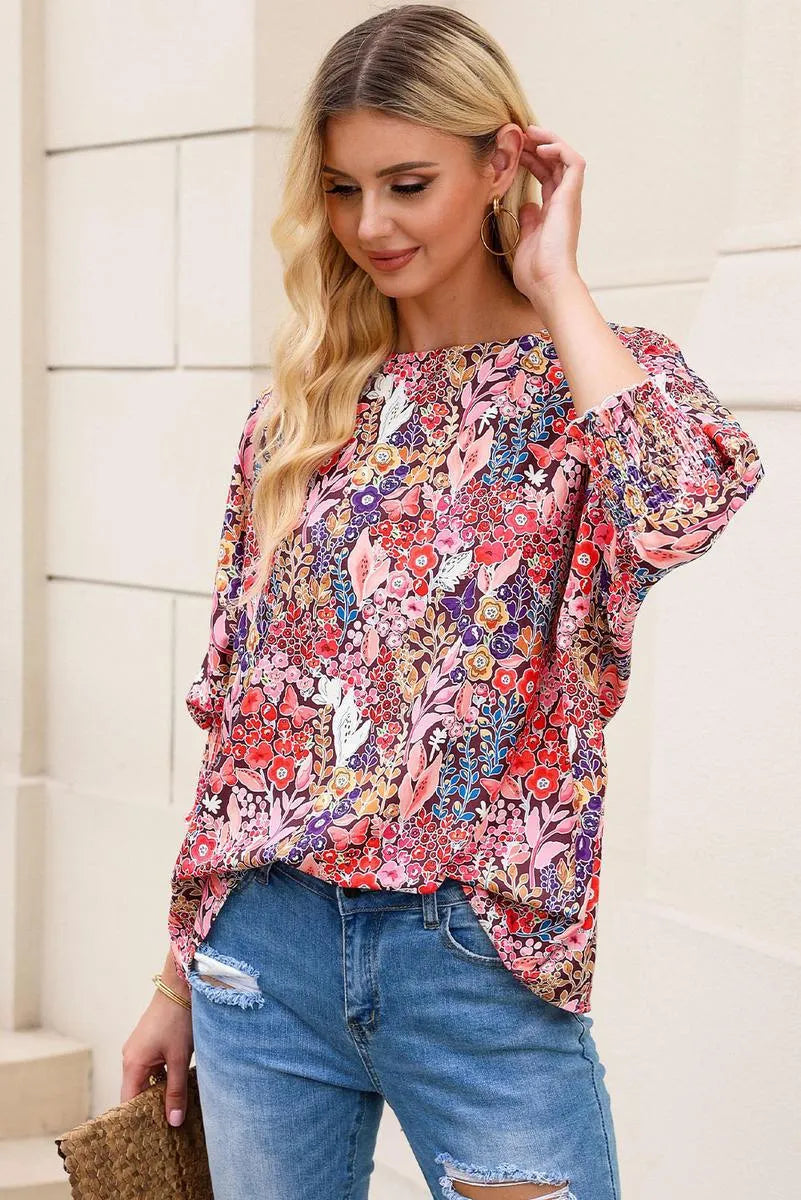 Get ready to bloom in style with our Floral Print Tunic Blouse