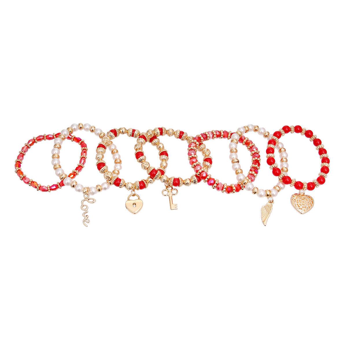 Make a Statement with Red & Faux Pearl Love Charm Bracelets: Shop the Latest Trends Now
