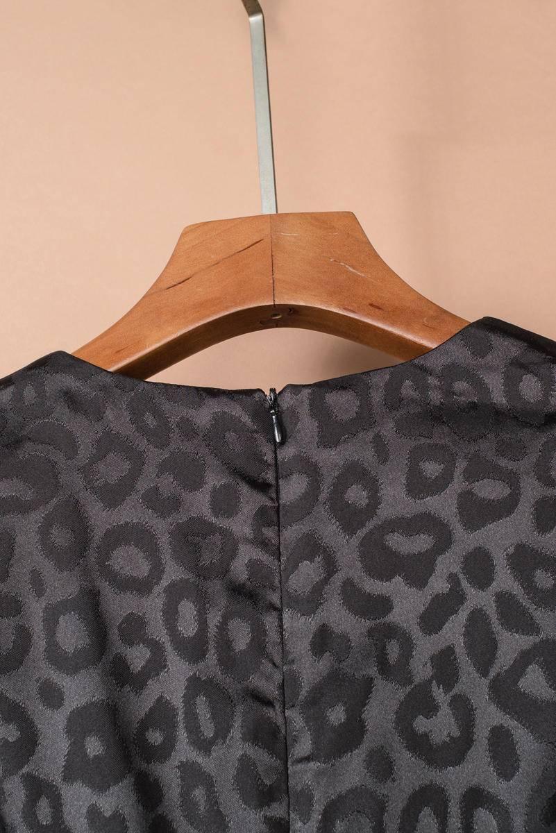 Seductive Mini Dress: Embrace Your Inner Leopard in Black