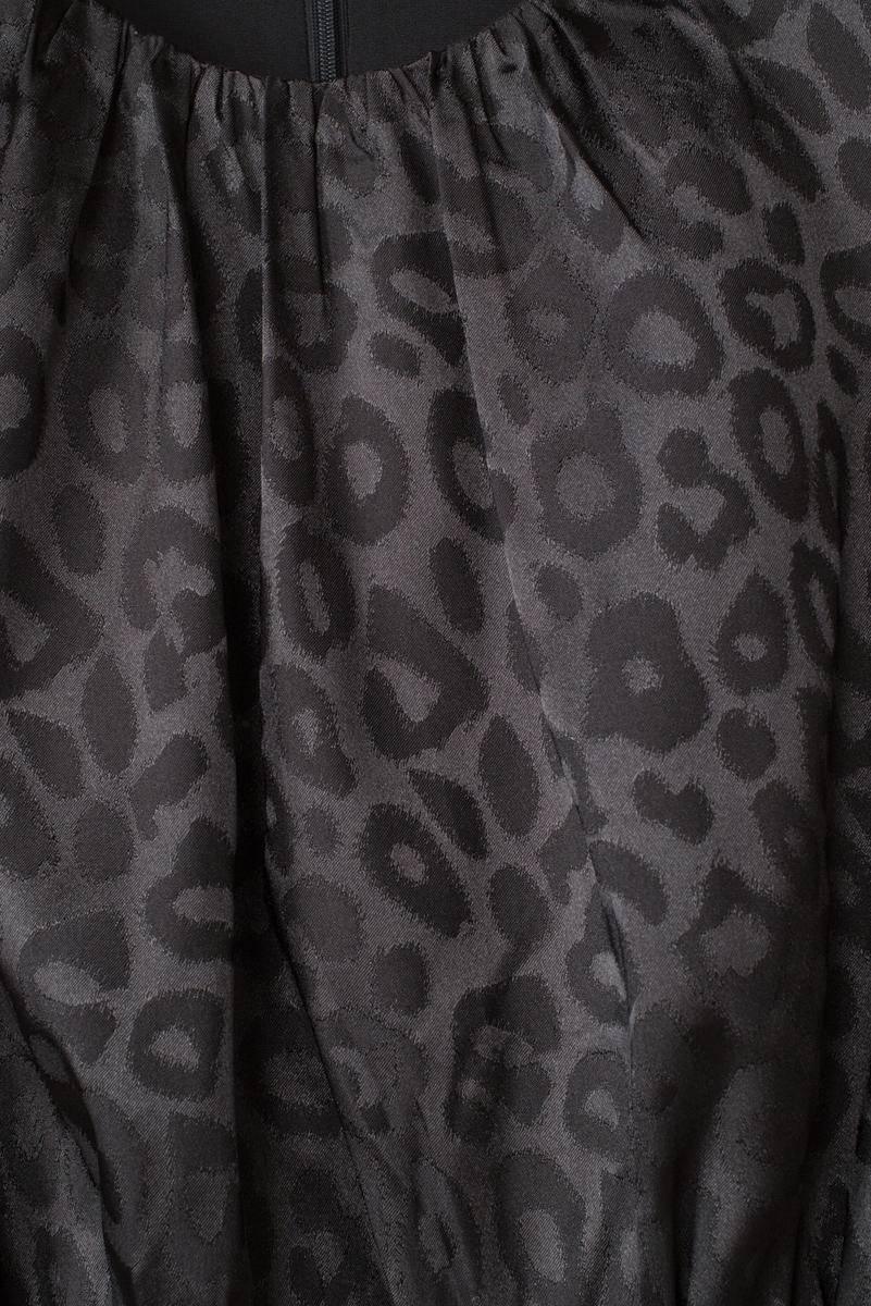 Seductive Mini Dress: Embrace Your Inner Leopard in Black