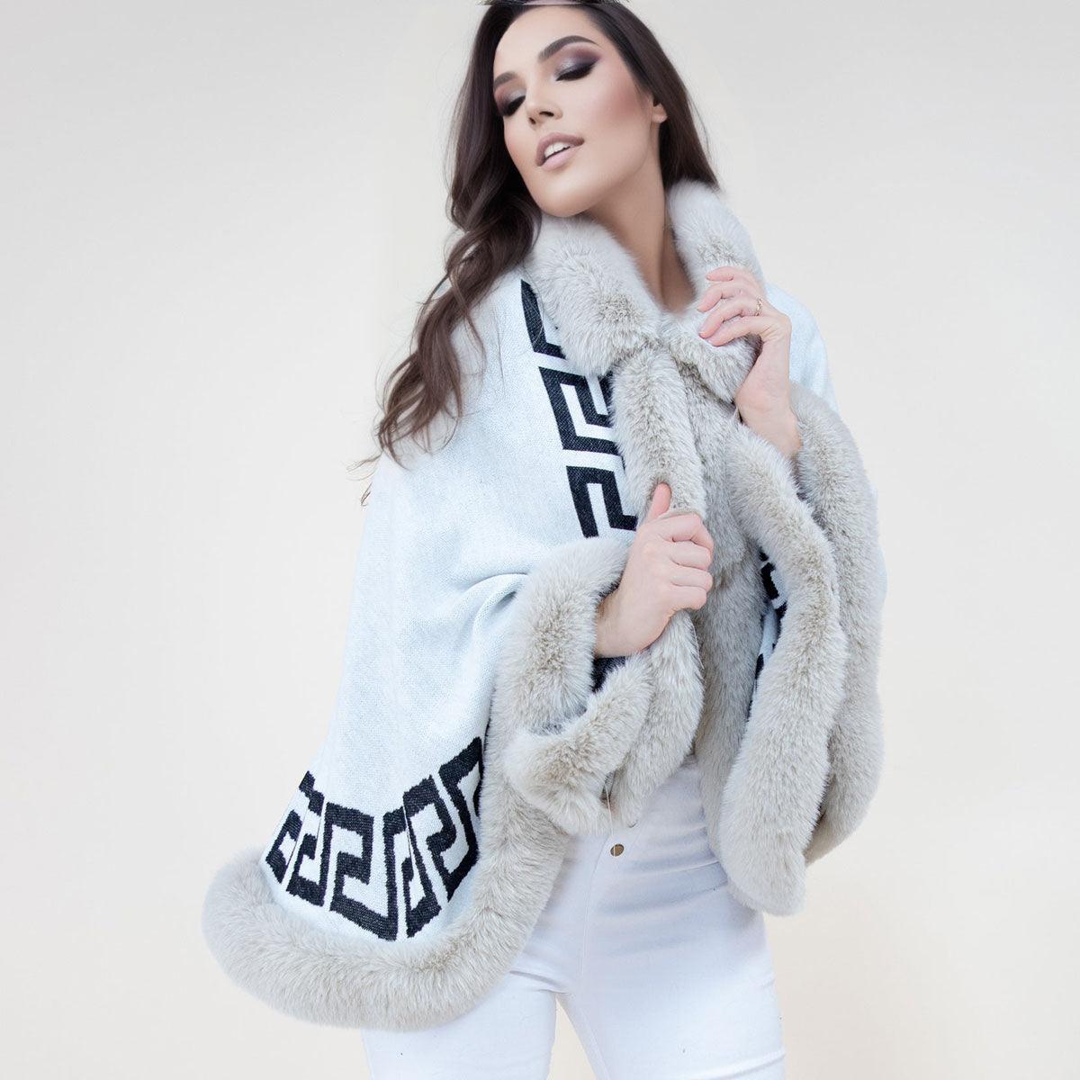 Stay cozy and stylish with our trendy Greek key design Shawl Cape Ruana Beige Faux Fur Trim Wrap